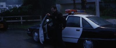 Still from Magnolia (1999) that has been tagged with: police car