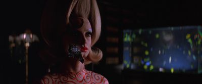 Still from Mars Attacks! (1996) that has been tagged with: clean single & aliens & night & medium close-up
