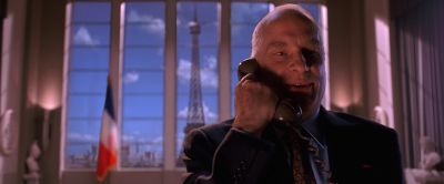 Still from Mars Attacks! (1996) that has been tagged with: 996666 & interior & eiffel tower & phone