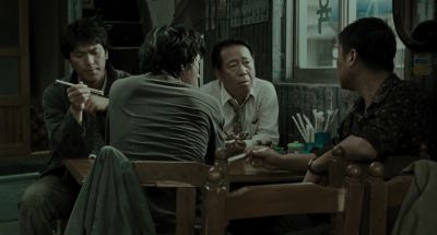 Still from Memories of Murder (2003) that has been tagged with: table