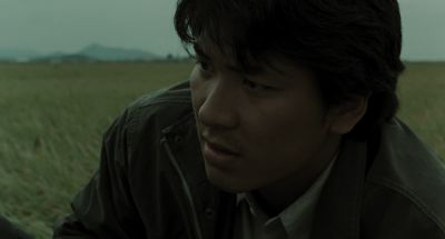 Still from Memories of Murder (2003) that has been tagged with: 534b4f & day & clean single & close-up