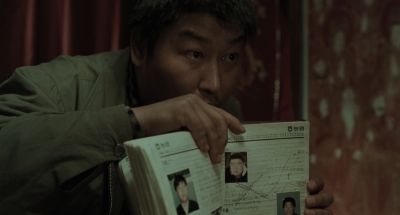 Still from Memories of Murder (2003) that has been tagged with: book