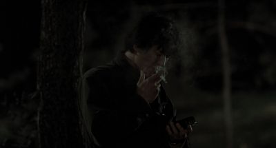 Still from Memories of Murder (2003) that has been tagged with: 000000 & night & smoking & medium shot