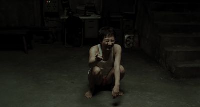 Still from Memories of Murder (2003) that has been tagged with: laughing & night