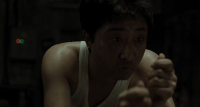 Still from Memories of Murder (2003) that has been tagged with: 000000 & medium close-up & night & interior