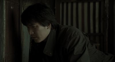 Still from Memories of Murder (2003) that has been tagged with: medium shot & exterior & peeking