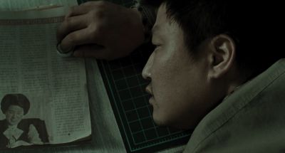 Still from Memories of Murder (2003) that has been tagged with: laying down
