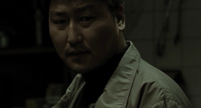 Still from Memories of Murder (2003) that has been tagged with: night & interior & medium close-up