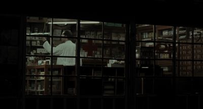 Still from Memories of Murder (2003) that has been tagged with: night & pharmacy & interior