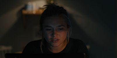 Still from Midsommar (2019) that has been tagged with: computer & medium close-up & clean single