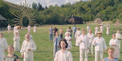 Still from Midsommar (2019) that has been tagged with: a67a59 & group-shot & day & high-angle