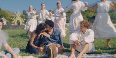 Still from Midsommar (2019) that has been tagged with: medium wide & kiss