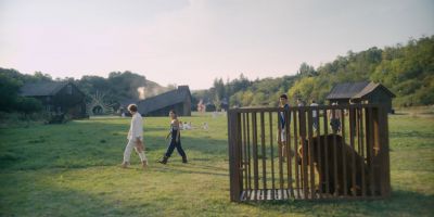 Still from Midsommar (2019) that has been tagged with: a67a59 & cage & wide shot & day