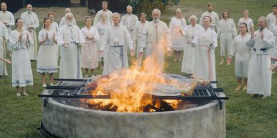 Still from Midsommar (2019) that has been tagged with: funeral & wide shot & dead body