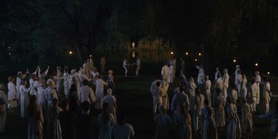 Still from Midsommar (2019) that has been tagged with: exterior & pond & crowd & audience & lake