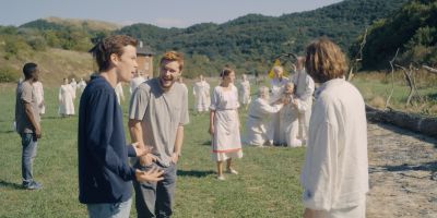 Still from Midsommar (2019) that has been tagged with: wide shot & laughing & day & field