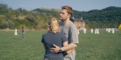 Still from Midsommar (2019) that has been tagged with: hug & field