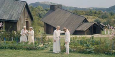 Still from Midsommar (2019) that has been tagged with: 9ab974 & group-shot & wide shot