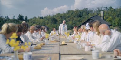 Still from Midsommar (2019) that has been tagged with: wide shot & banquet & exterior