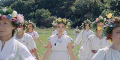 Still from Midsommar (2019) that has been tagged with: group-shot & exterior