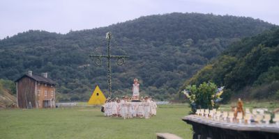 Still from Midsommar (2019) that has been tagged with: 826745 & exterior & group-shot