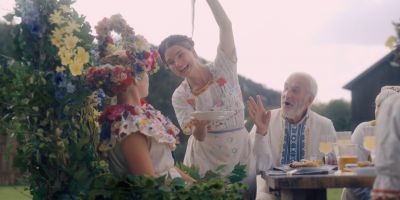 Still from Midsommar (2019) that has been tagged with: three-shot & exterior