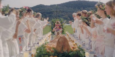 Still from Midsommar (2019) that has been tagged with: wide shot & banquet & field
