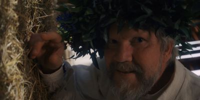Still from Midsommar (2019) that has been tagged with: close-up & day & dutch-angle & interior