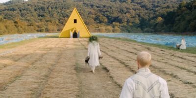 Still from Midsommar (2019) that has been tagged with: day & over-the-shoulder & wide shot & two-shot