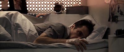 Still from Moon (2009) that has been tagged with: bed & medium close-up & day & clean single & bedroom
