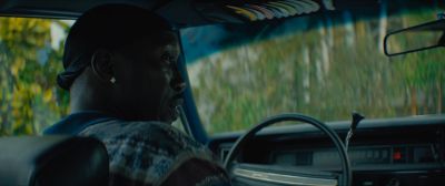 Still from Moonlight (2016) that has been tagged with: 40826d & over-the-shoulder & interior & car interior