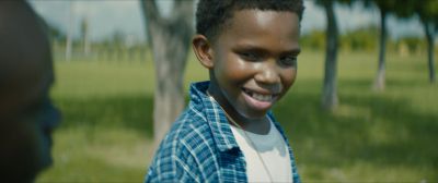 Still from Moonlight (2016) that has been tagged with: laughing & close-up
