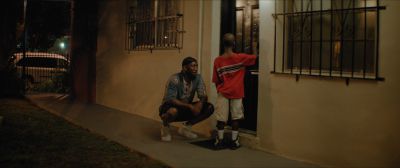 Still from Moonlight (2016) that has been tagged with: 331414 & two-shot & over-the-shoulder & wide shot