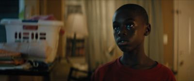 Still from Moonlight (2016) that has been tagged with: 1a2321 & medium close-up & clean single