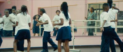 Still from Moonlight (2016) that has been tagged with: 26619c & group-shot & gym & day