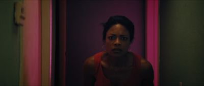 Still from Moonlight (2016) that has been tagged with: interior & medium close-up & apartment & night & clean single & hallway