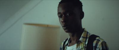 Still from Moonlight (2016) that has been tagged with: clean single & medium close-up & day