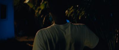 Still from Moonlight (2016) that has been tagged with: a67a59 & exterior & night & over-the-shoulder