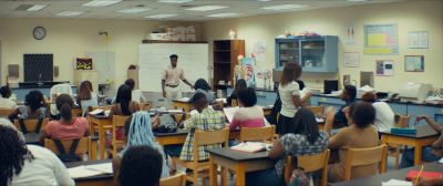 Still from Moonlight (2016) that has been tagged with: wide shot & day & group-shot & interior & classroom
