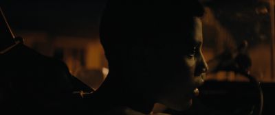Still from Moonlight (2016) that has been tagged with: 7a3f00 & close-up