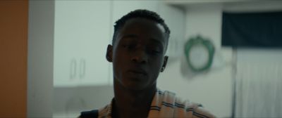 Still from Moonlight (2016) that has been tagged with: 355f3b & interior & day & medium close-up