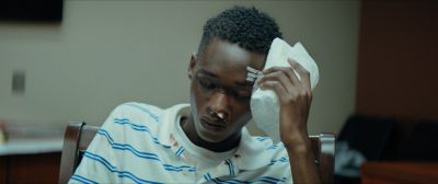 Still from Moonlight (2016) that has been tagged with: 74c3fb & interior & clean single & medium close-up & day
