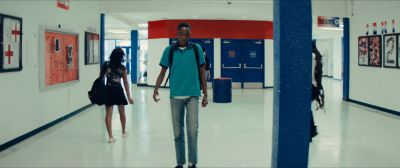 Still from Moonlight (2016) that has been tagged with: wide shot & day & hallway & clean single & high school