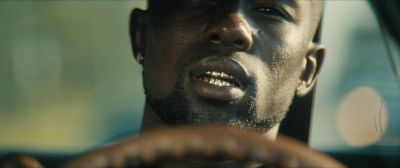 Still from Moonlight (2016) that has been tagged with: driving & close-up