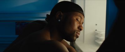 Still from Moonlight (2016) that has been tagged with: 013220 & clean single & day & medium close-up