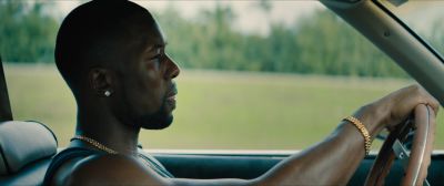 Still from Moonlight (2016) that has been tagged with: 355f3b & medium close-up & day