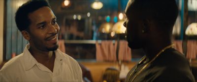 Still from Moonlight (2016) that has been tagged with: interior & restaurant & diner & night & over-the-shoulder