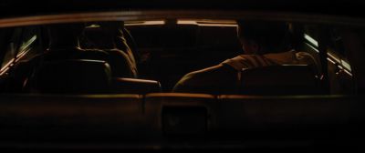 Still from Moonlight (2016) that has been tagged with: 714214 & medium wide & car interior