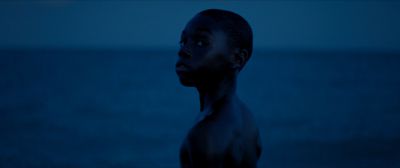 Still from Moonlight (2016) that has been tagged with: exterior & night & medium shot