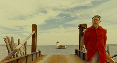 Still from Moonrise Kingdom (2012) that has been tagged with: wide shot & pier & clouds & sky & clean single